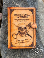 Load image into Gallery viewer, "Thieve's Guild Handbook" Medium Notebook Cover