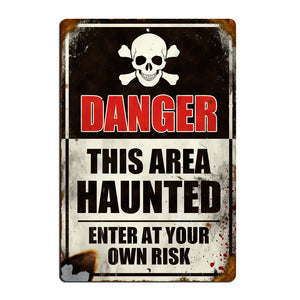 "DANGER - HAUNTED" metal sign