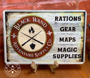 Black Wand Adventure Supply metal sign