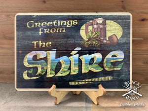 "Greetings from the Shire" metal sign